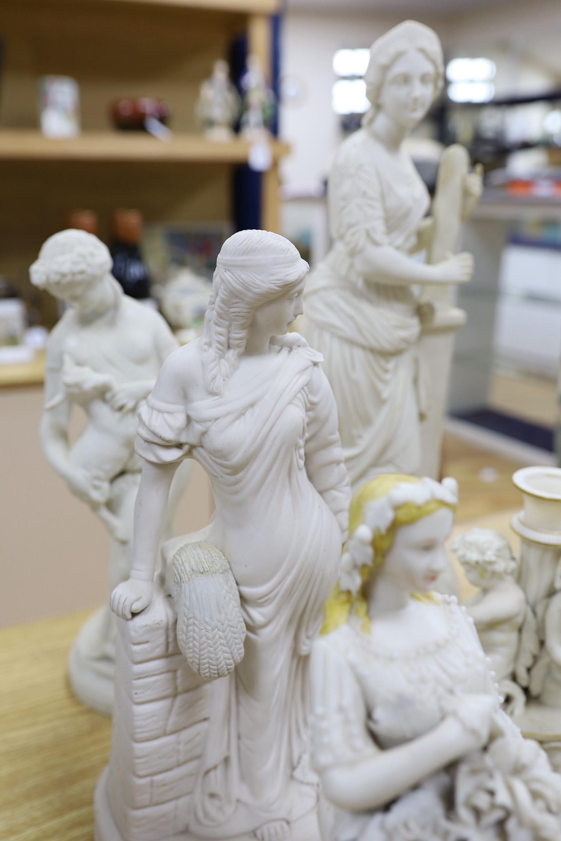 A group of Parian ware and bisque figures/ornaments. Some restoration (8) tallest 45cm